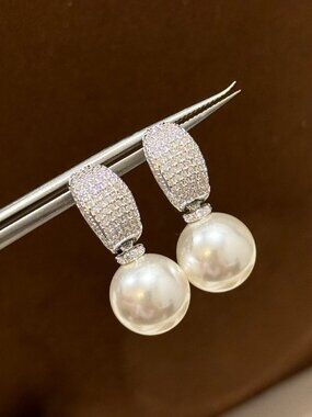 Mikimoto pearl and diamond stud earrings